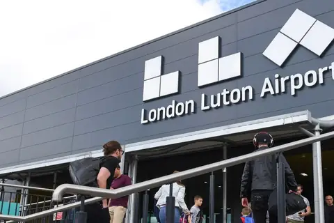 Entrance to the London Luton Airport terminal with its signage